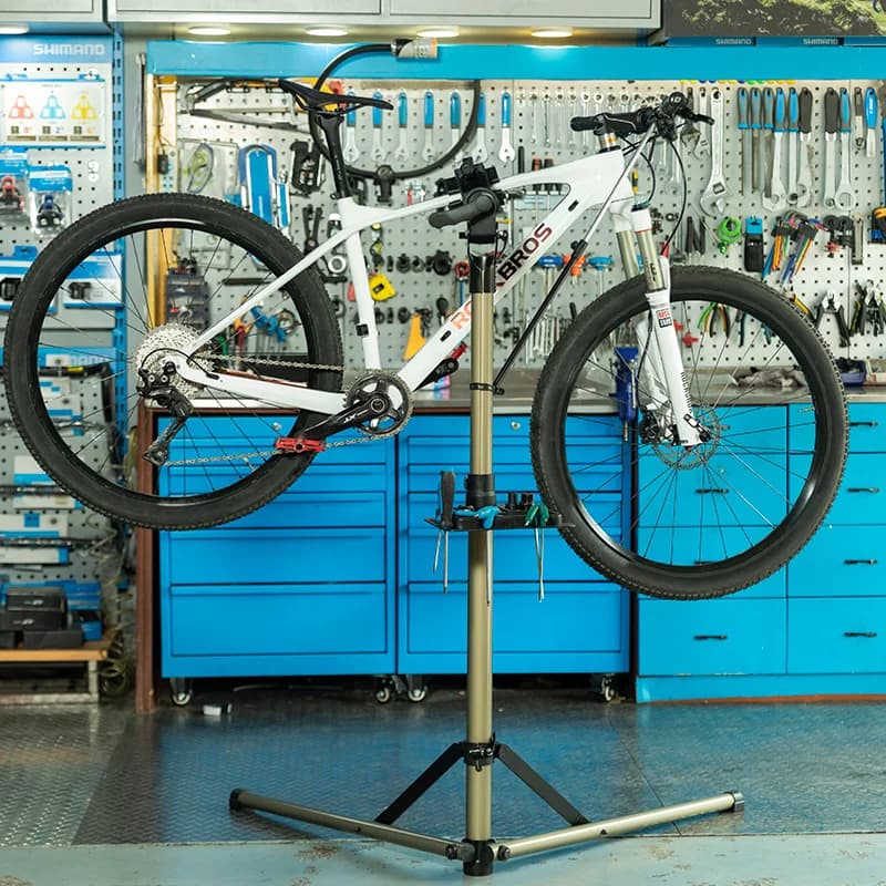 Support de réparation de vélo pliable avec plateau à outils